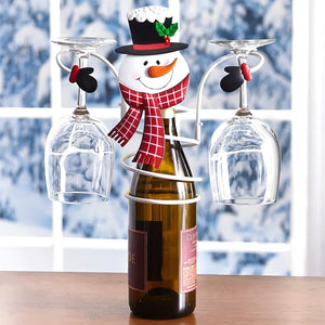 Botellas de vino y estante para copas para las vacaciones de Navidad