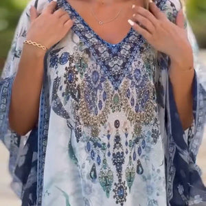 Vestido largo asimétrico con escote en pico y corte holgado