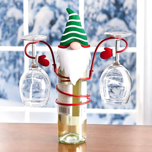 Botellas de vino y estante para copas para las vacaciones de Navidad