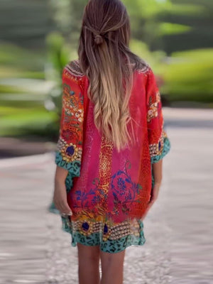 Vestido largo asimétrico con escote en pico y corte holgado