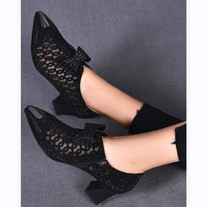 Zapatos elegantes con tacones