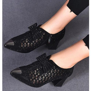 Zapatos elegantes con tacones
