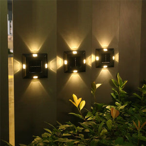 Lámpara de pared solar de plástico de cuatro lados