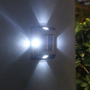 Lámpara de pared solar de plástico de cuatro lados