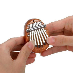 Mini Piano de Pulgar